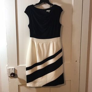 Black and white capsleeve knee length dress